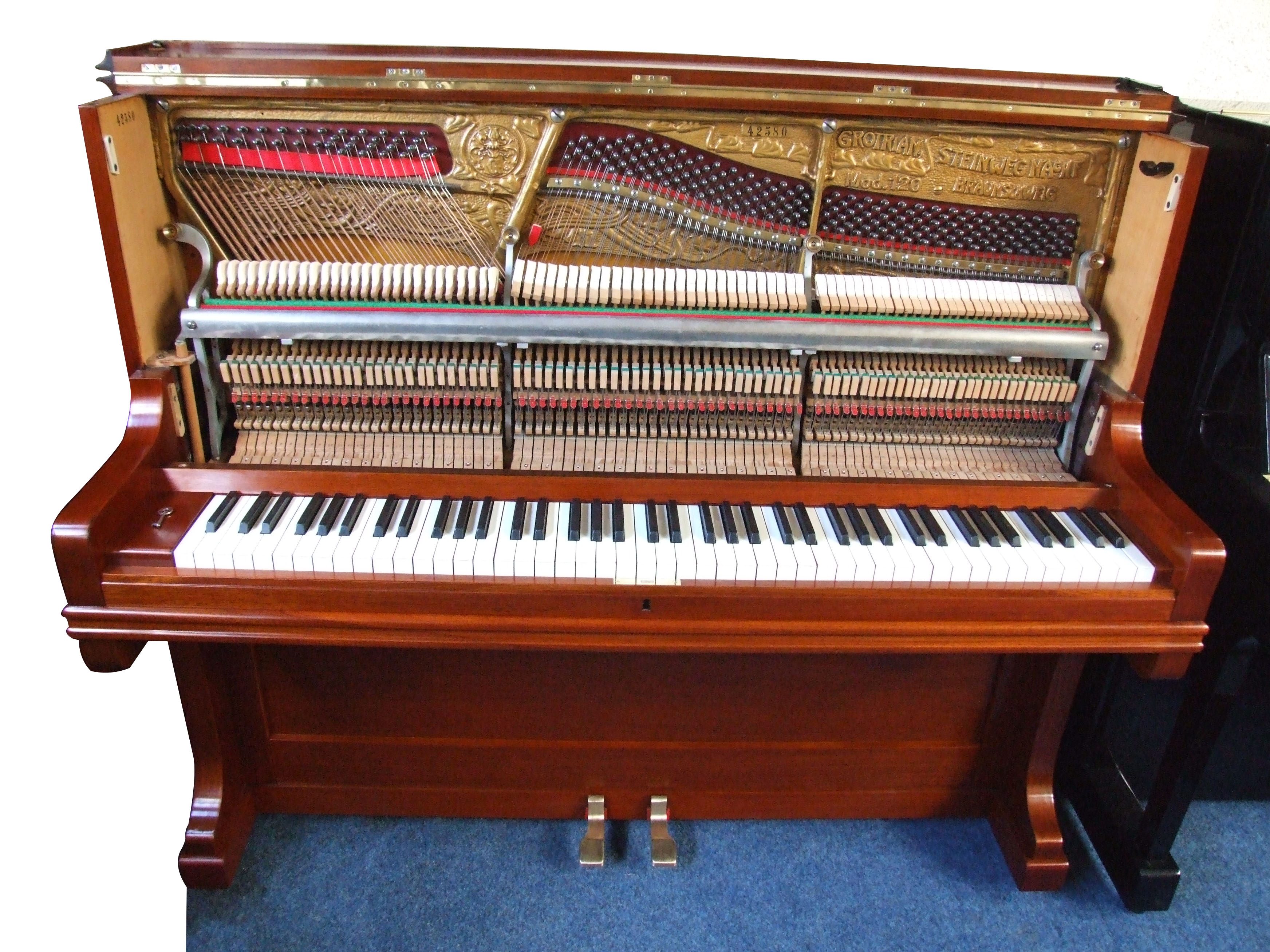 Grotrian Steinweg upright piano in rosewood soundboard